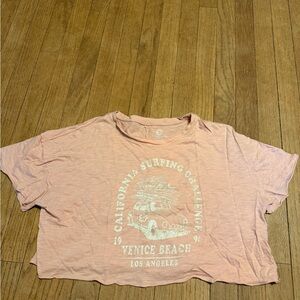 Pink Crop Top with Surfing Graphic